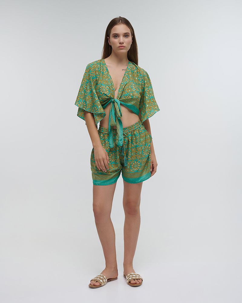 Completo top e shorts