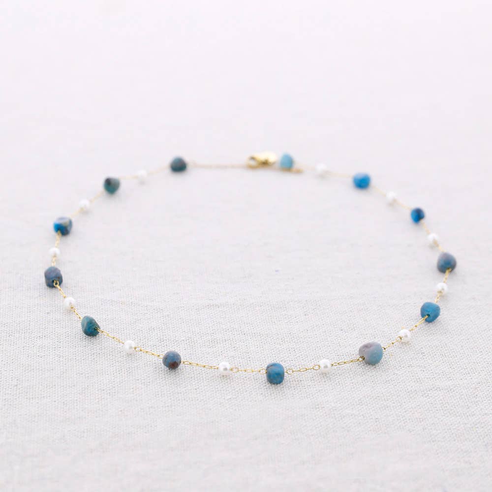 Collana in acciaio con pietre di perle