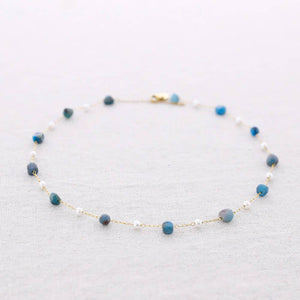 Collana in acciaio con pietre di perle