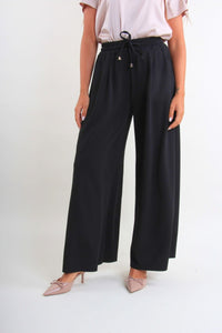 Pantaloni con coulisse regolabile