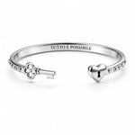 Load image into Gallery viewer, Bracciale “Qui siamo tutti matti!”
