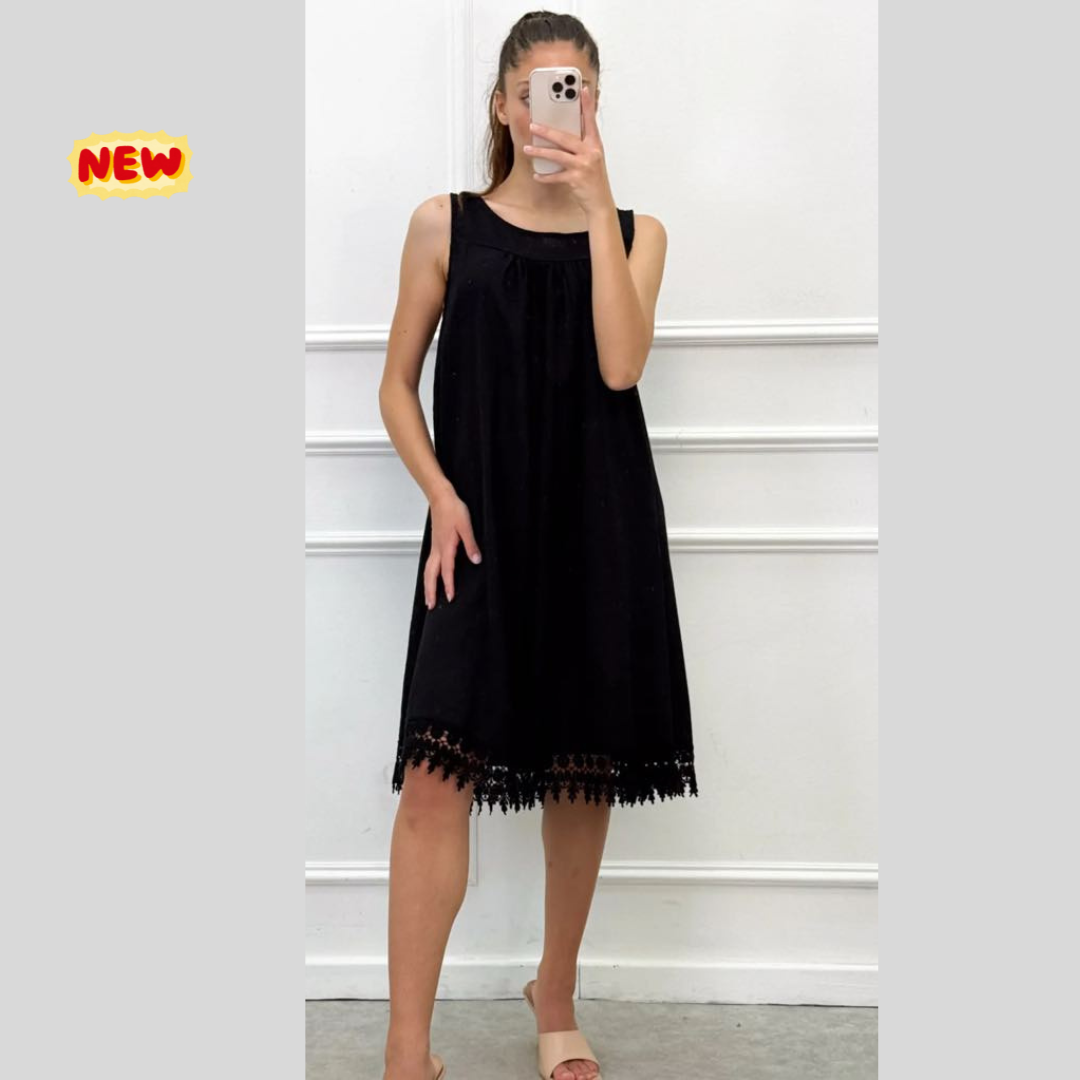 Abito smanicato con pizzo