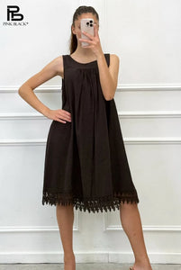Abito smanicato con pizzo