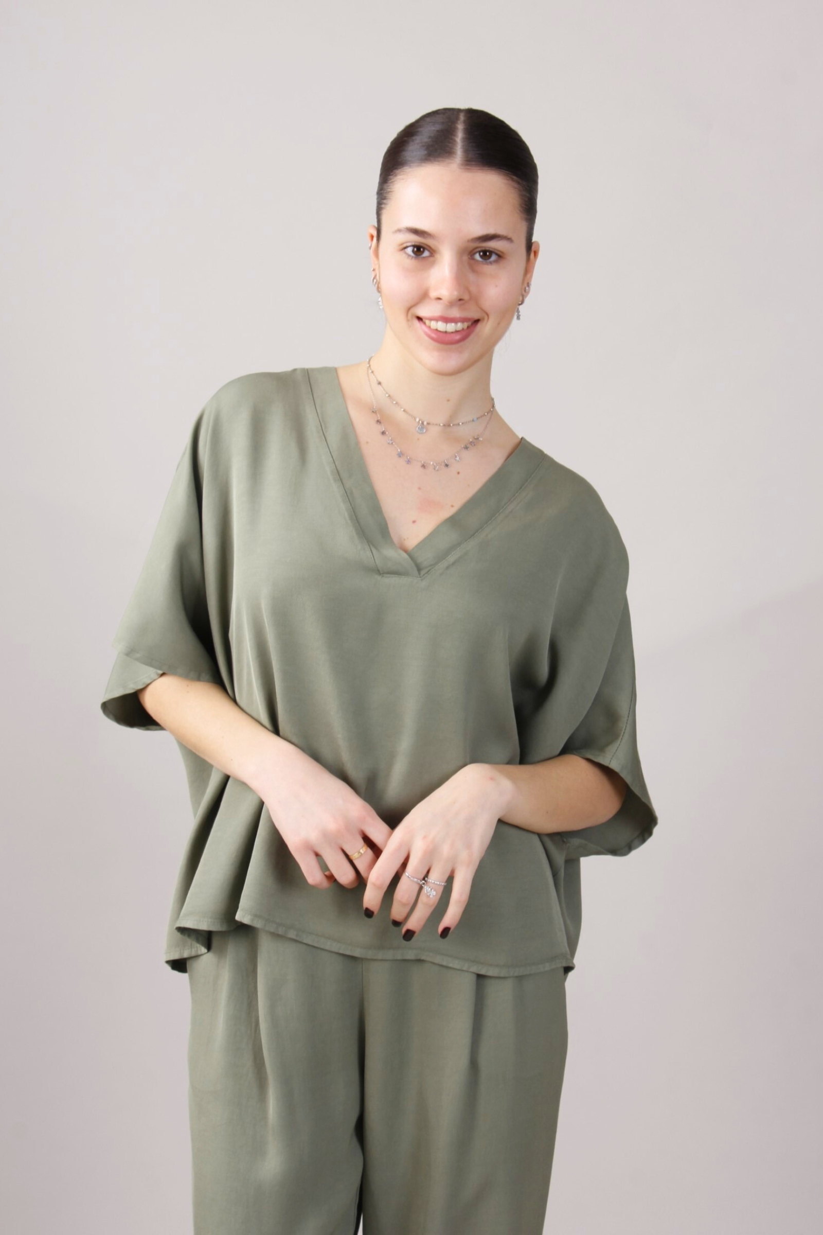 Blusa con maniche a pipistrello