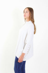 Maglia con bottoni decorativi