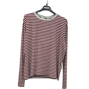 Maglia a maniche lunghe con spilla