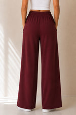 Load image into Gallery viewer, Pantalone a palazzo effetto tuta
