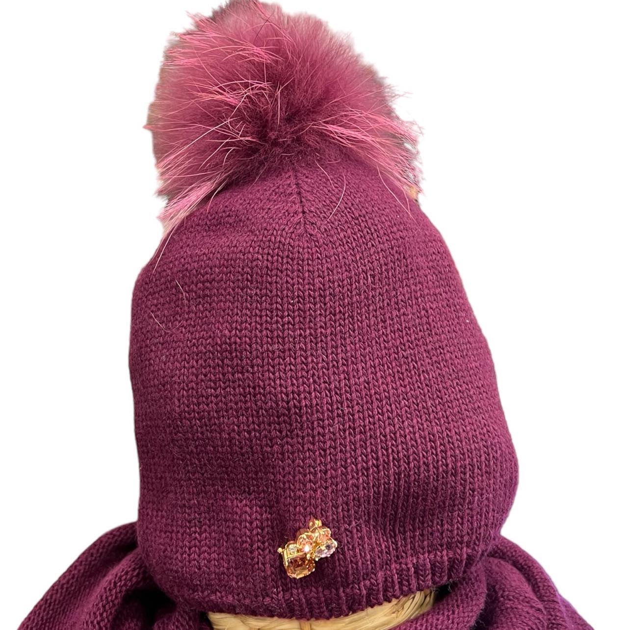 Cappello cuffia con pompon