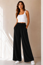 Load image into Gallery viewer, Pantalone a palazzo effetto tuta
