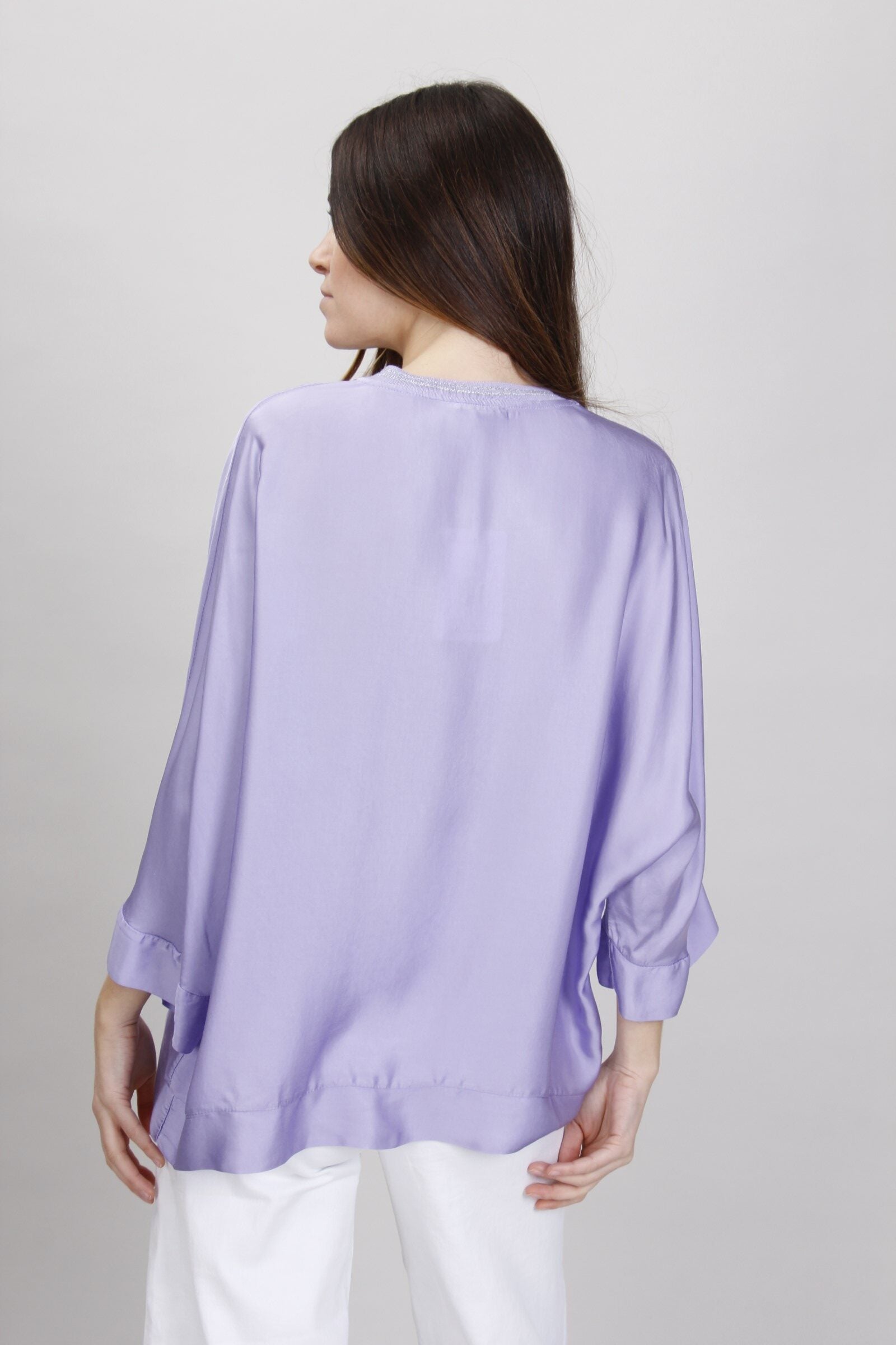 BLUSA DETTAGLI IN LUREX SCOLLO A V