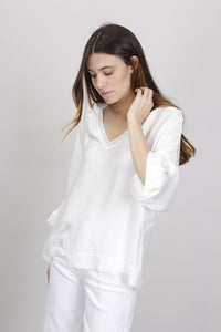 BLUSA DETTAGLI IN LUREX SCOLLO A V