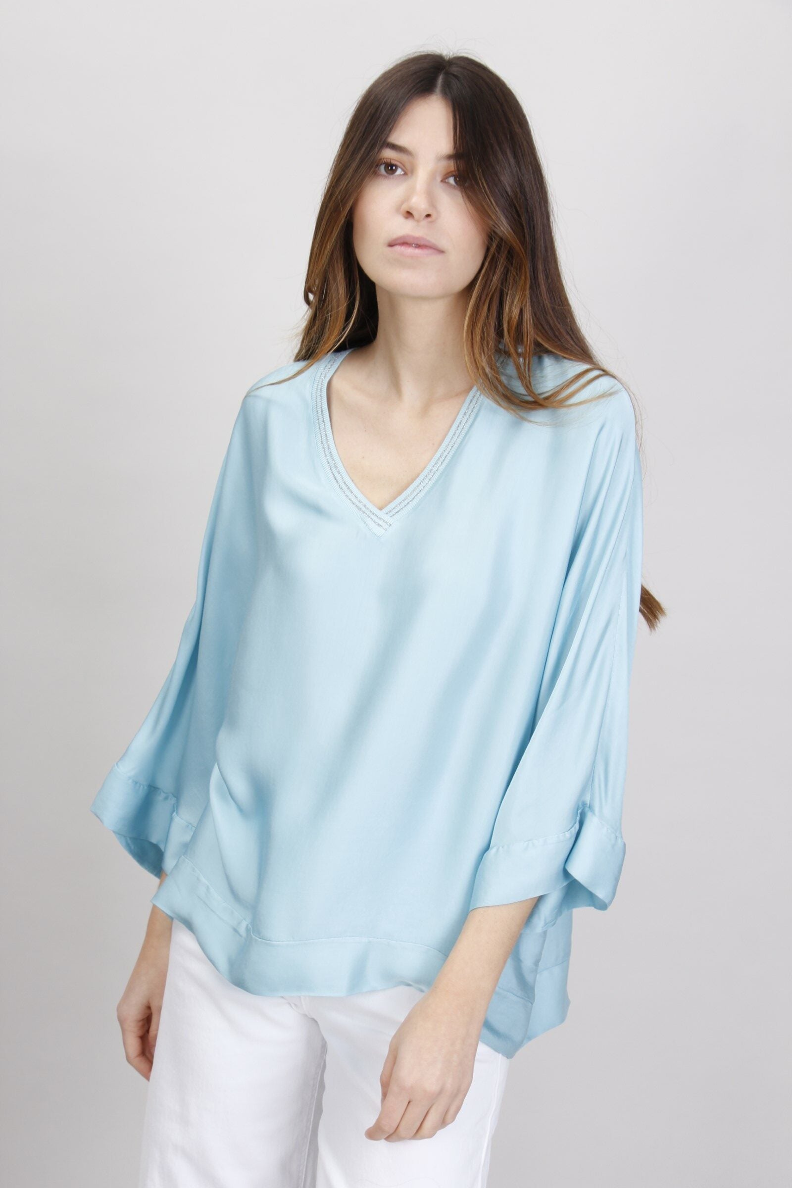 BLUSA DETTAGLI IN LUREX SCOLLO A V